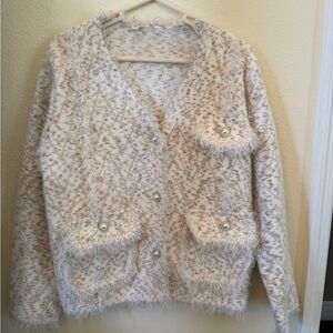 Cozy Cream and Tan Cardigan, size medium, never worn.